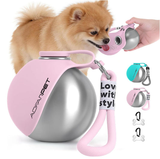 Pomeranian drinking from a pink Pawsport portable dog water bottle with fold-out bowl
