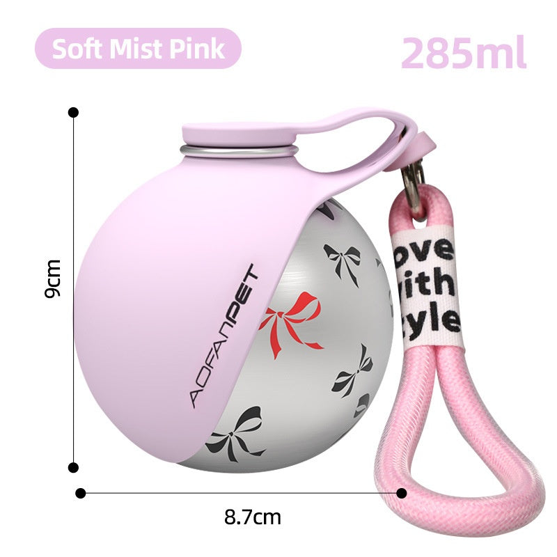 Soft pink Pawsport dog water bottle with fold-out silicone bowl and carry strap