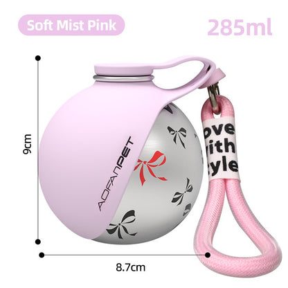 Soft pink Pawsport dog water bottle with fold-out silicone bowl and carry strap